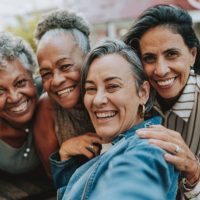 Portrait group of friends taking selfie